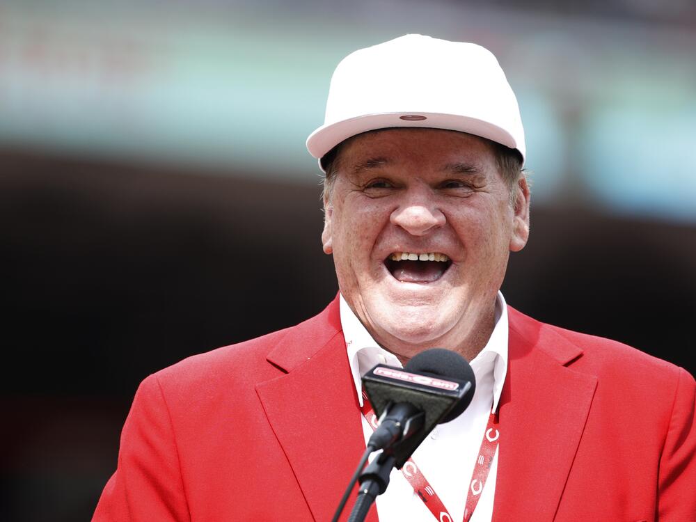 Former Cincinnati Reds great Pete Rose reacts during a statue dedication ceremony prior to a game against the Los Angeles Dodgers on June 17, 2017 in Cincinnati, Ohio. Major League Baseball removed Rose, 'Shoeless' Joe Jackson and 15 other deceased players from the sport's permanent ineligibility list — clearing the way for a possible induction into the Hall of Fame.