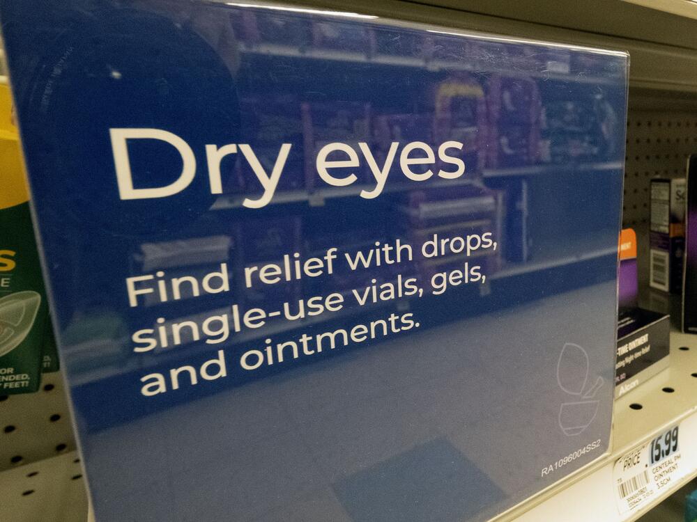 A selection of eye drops line a shelf at a pharmacy in Los Angeles in December 2023.