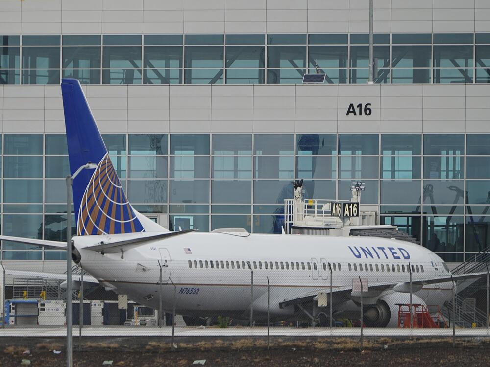 A United Airlines jetliner prepares to push off from a gate at Denver International Airport on May 7. Air traffic controllers in Denver experienced a communications blackout on Monday that lasted for about two minutes.