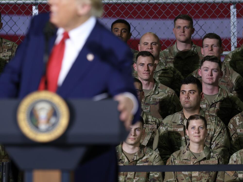 Michigan Air National Guard troops listen as President Trump speaks during a visit with Michigan Air National Guard Troops on April 29 at Selfridge Air National Guard Base, Mich.