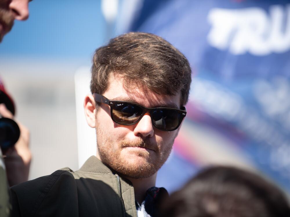 Nick Fuentes, seen here in 2020, is widely known for his white nationalist and antisemitic views, including Holocaust denial. An official in the Trump administration advocated for the social media platform X to remove its ban on Fuentes over hate speech and was also spotted in the crowd at a 2024 Fuentes rally.