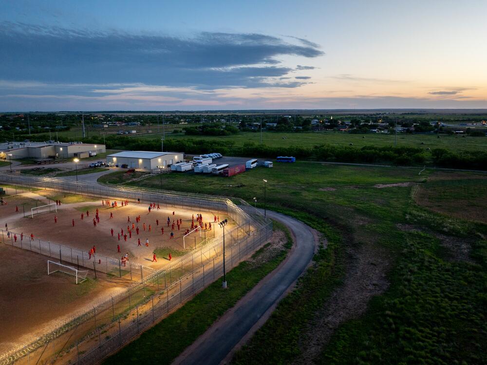 In an aerial view, inmates are seen in the courtyard at the Bluebonnet Detention Center on May 12 in Anson, Texas. ICE has begun transferring illegal immigrant detainees to the Bluebonnet Detention Center after U.S. District Judge Wesley Hendrix readily offered the facility to the Trump administration under the Alien Enemies Act.