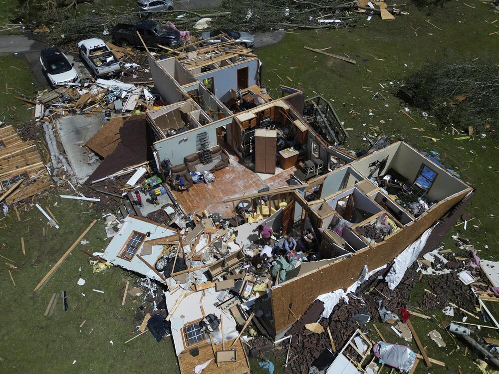 A home is destroyed after a severe storm passed the area in London, Ky., on Saturday.