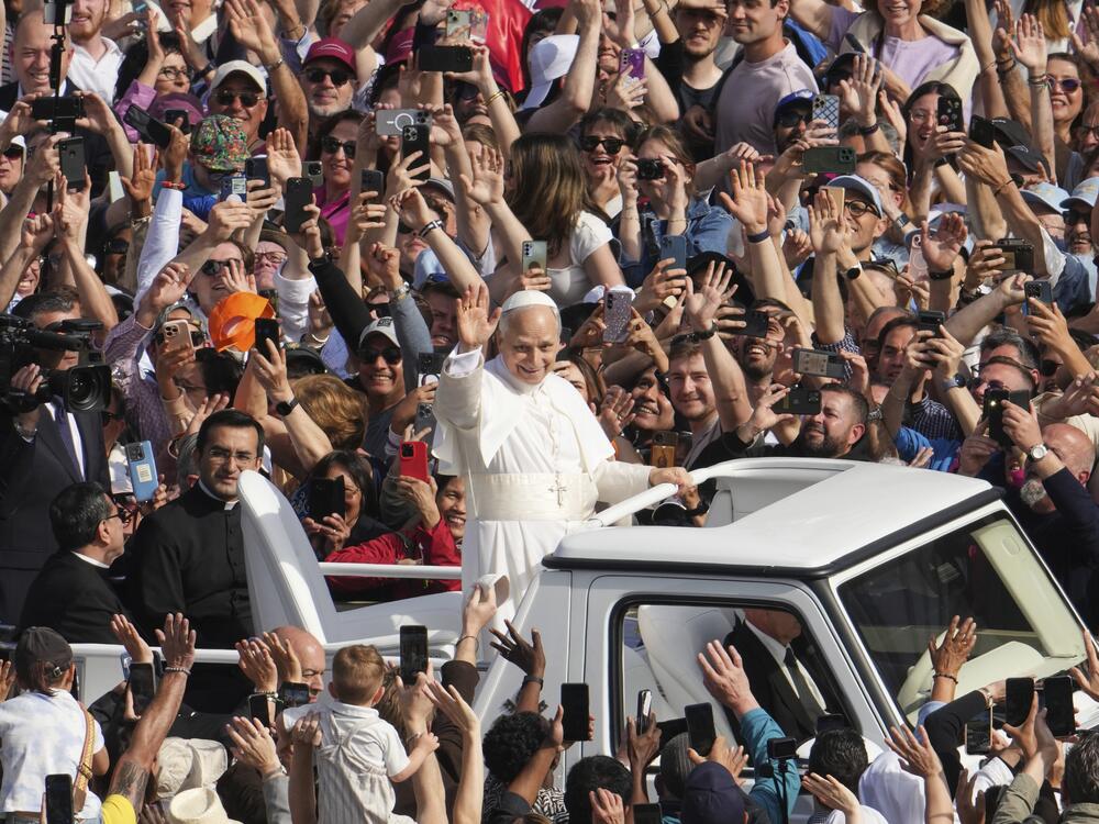 Pope Leo XIV on his popemobile tours St. Peter's Square at the Vatican prior to the inaugural Mass of his pontificate, Sunday, May 18, 2025.