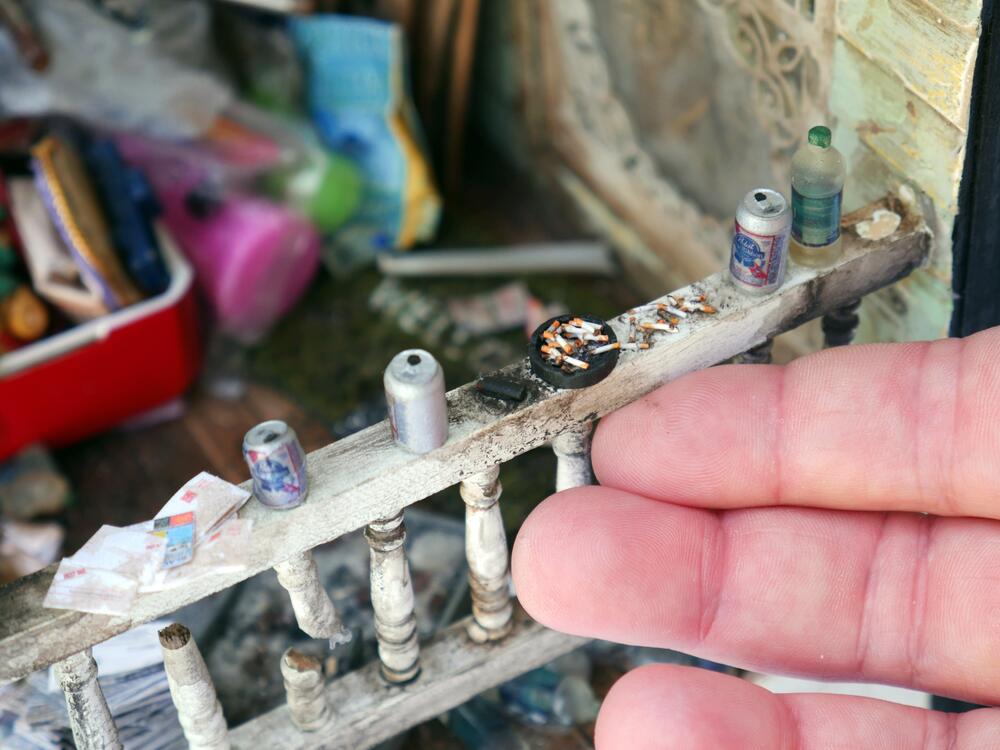 This photo shows the detail of Amanda Kelly's artwork <em>Hoarder's Porch.</em>