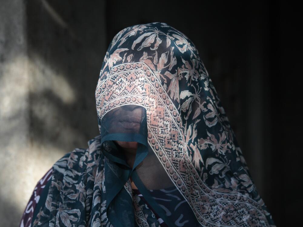 Chetna Rabari is photographed near her cow feeding station in the northern Indian village of Vaghpur, on March 17.
