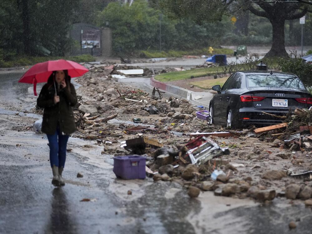 Mud and debris as atmospheric rivers dumped rain in Studio City, Calif., in 2024. Forecasting heavy rain requires measurements from satellites, doppler radar, ocean buoys and other instruments, most of which are operated by the federal government.