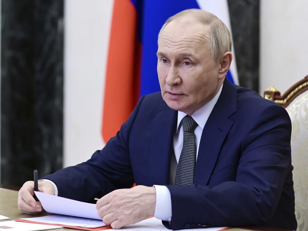 Russian President Vladimir Putin chairs a Security Council meeting via videoconference at the Kremlin in Moscow, Friday.