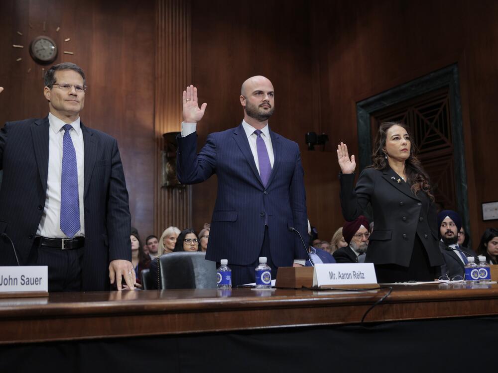 Harmeet Dhillon, far right, is sworn in during her confirmation hearing before the Senate Judiciary Committee in February 2025 in Washington, D.C.