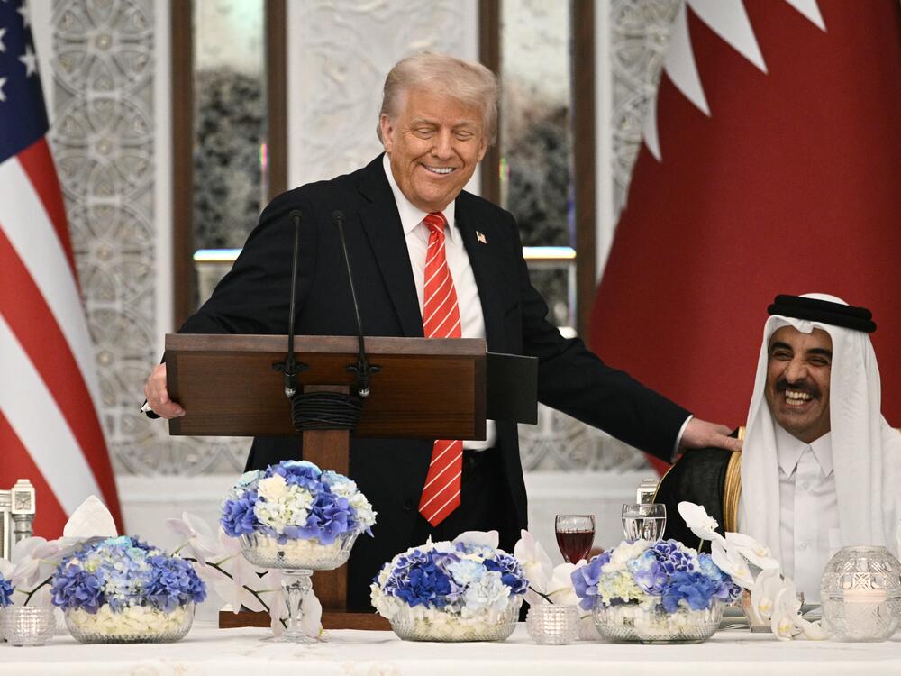 President Trump and Qatar's Emir Sheikh Tamim bin Hamad al-Thani at the start of a state dinner at the Lusail Palace in Doha on May 14, 2025.