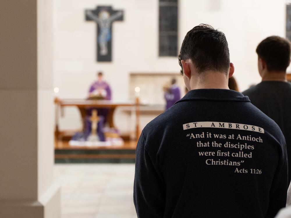 Wednesday night Mass at St. Ambrose University attracts a congregation of mostly students. On one recent evening, they added a prayer for the university's new partnership with Mount Mercy University.
