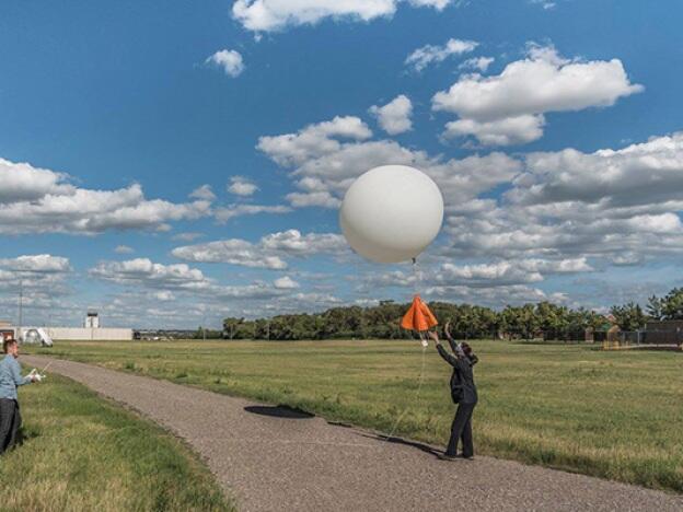 A National Weather Service weather balloon launches in Bismarck, N.D., in June 2017. Weather balloons go up more than 5 miles into the atmosphere and transmit measurements back to the ground continuously as they fly.