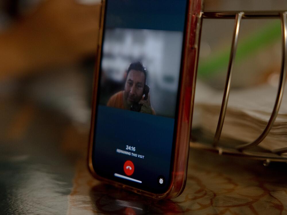 Maurilio Ambrocio talks with his daughter, Ashley, while in detention, in Tampa, Florida. Maurilio left Guatemala over twenty years ago and is a pastor at an Evangelical Church, supporting his wife and five children.