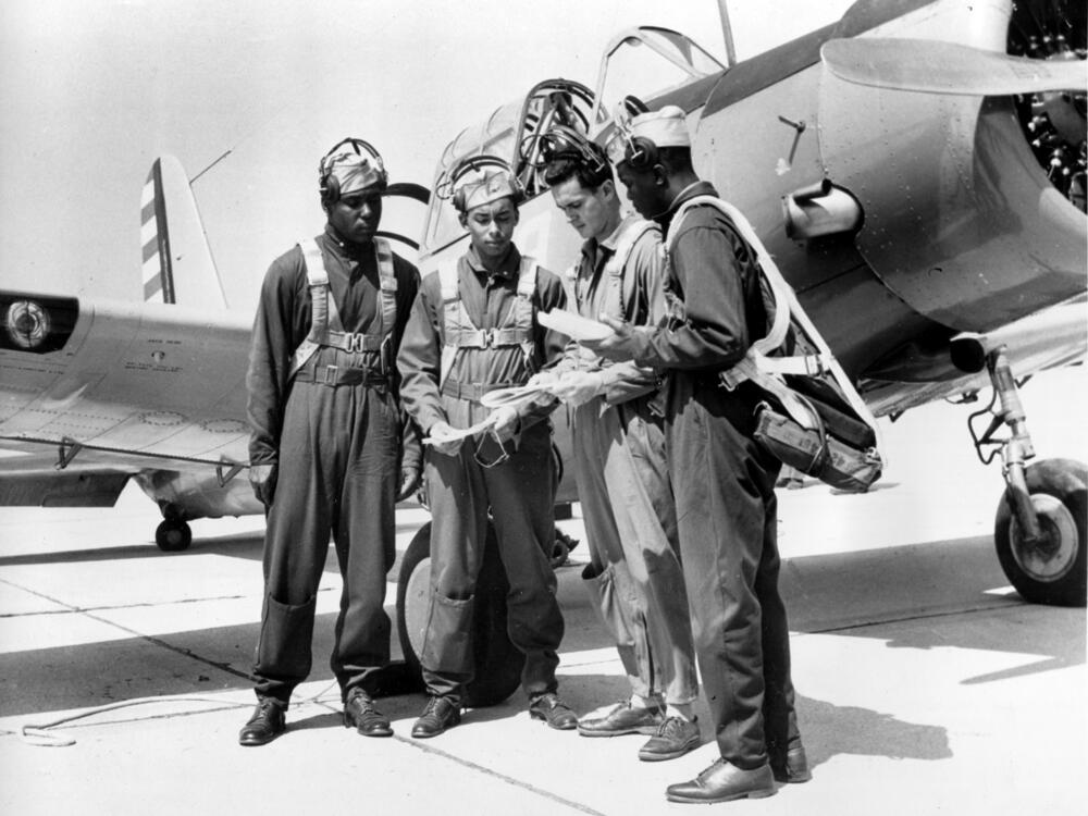 Cadets training to join the first black combat unit in the U.S. Army Air Corps are seen with an instructor in Tuskegee, Ala., on Sept. 5, 1942.
