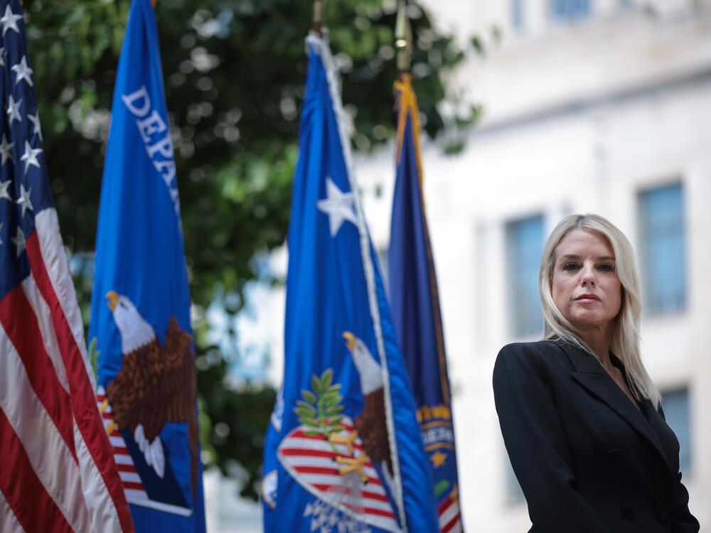 U.S. Attorney General Pam Bondi is seen during a press conference on May 7 in Washington, D.C. Bondi's Department of Justice recently charged a few noncitizens for alleged illegal voting, citing assistance from the Department of Government Efficiency, or DOGE.