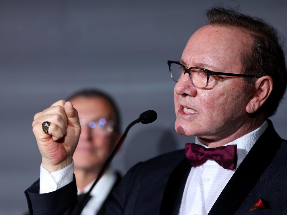 Kevin Spacey speaks on stage at the Better World Fund Gala in Cannes, France, where he was honored with a lifetime achievement award.<br><br>