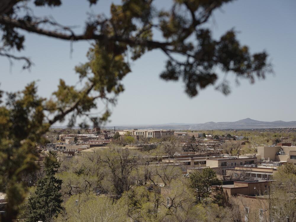 A view of Santa Fe from the Cross of the Martyrs monument in Santa Fe, New Mexico. So many Texans have fled to New Mexico's capital that some folks are calling it 