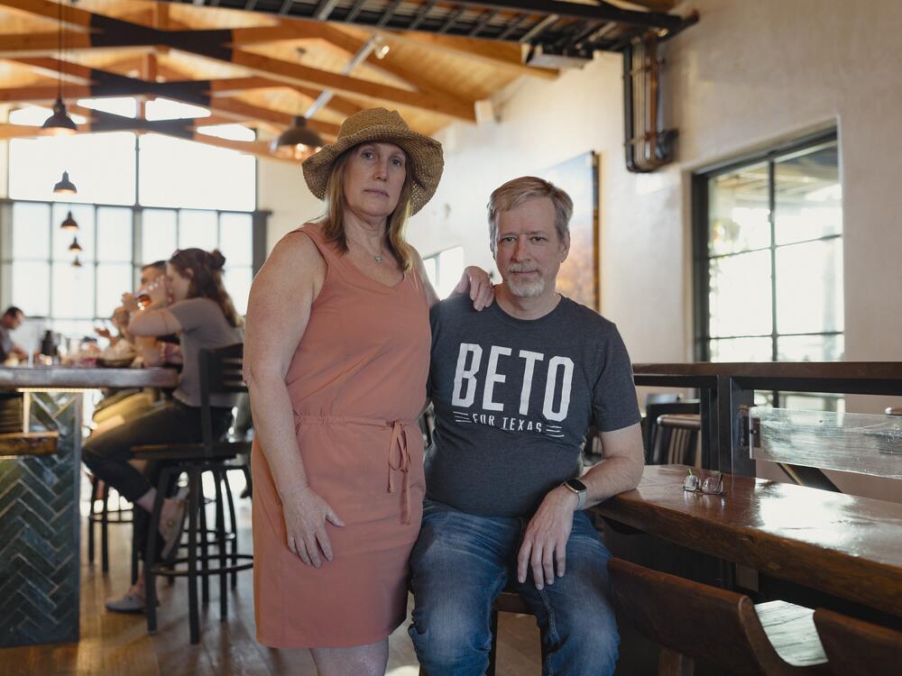 Stephanie Bonzek and partner Donovan Kolby pose for a portrait inside Nuckolls Brewing Company in Santa Fe on April 9. Bonzek says they moved to New Mexico because the state is 