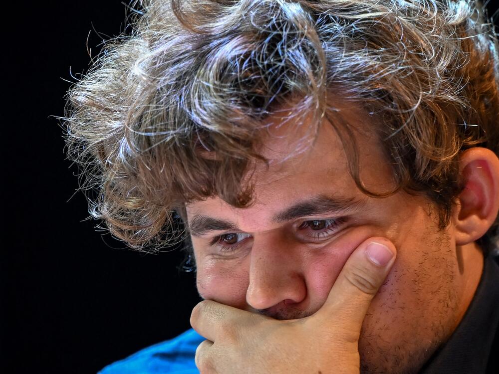 Norway's chess grandmaster Magnus Carlsen gestures during a game in the Tata Steel Chess India tournament in Kolkata on Nov. 17, 2024.