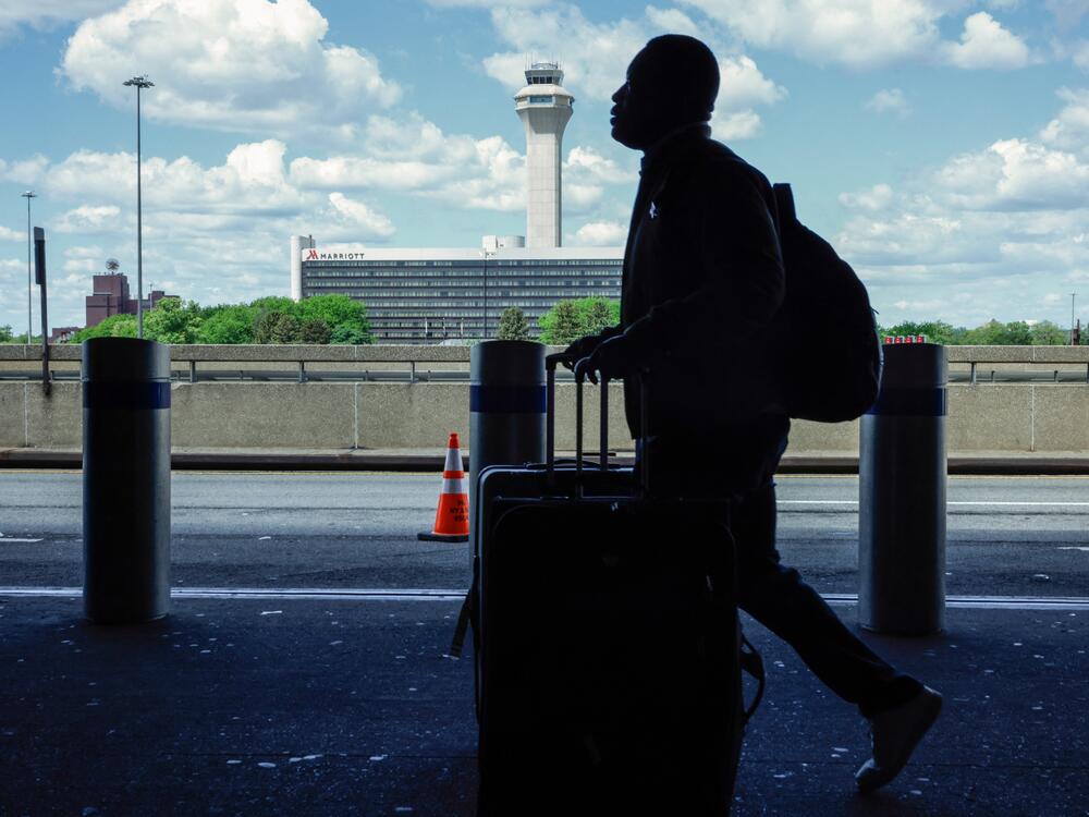 The FAA Air Traffic Control tower is seen at Newark Liberty International Airport in Newark, N.J., earlier this month. Regulators have been slowing arrivals and departures at one of the United States' busiest airports following a 90-second traffic control system outage.
