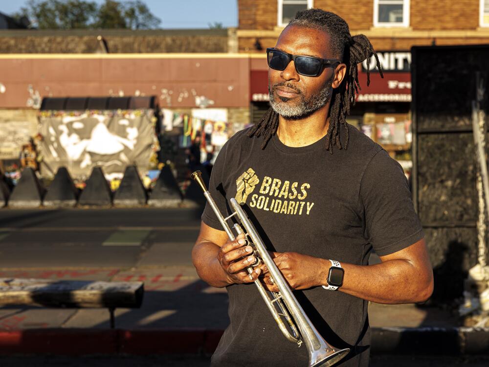 Butchy Austin, one of the musicians who meets weekly at George Floyd Square, says the music they play brings joy and a message of protest.
