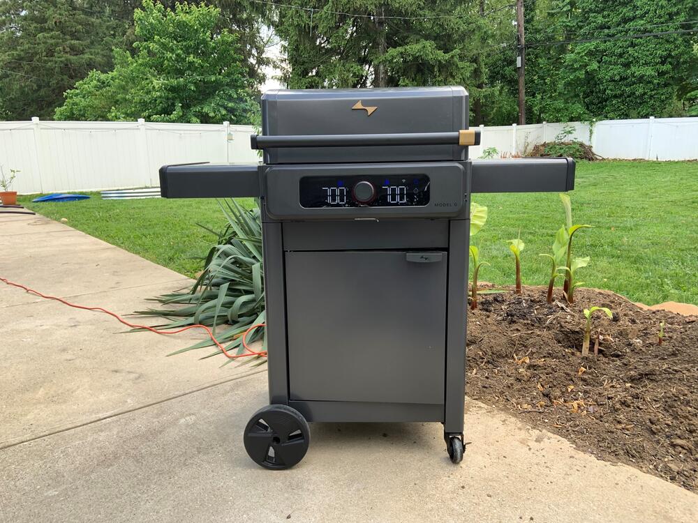 The Current Backyard grill can reach temperatures of 700 degrees Fahrenheit and plugs into a standard outlet. The parent company also makes Charbroil brand grills and says demand for electric grills is increasing.