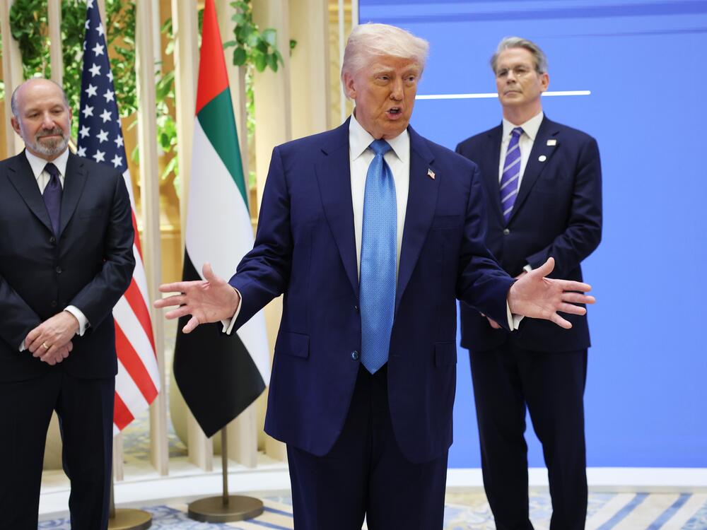 President Trump speaks at an investment forum in Abu Dhabi, United Arab Emirates, on May 16 with Commerce Secretary Howard Lutnick and Treasury Secretary Scott Bessent.