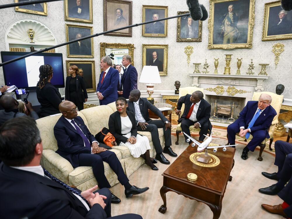 US President Donald Trump, right, and Cyril Ramaphosa, South Africa's president, second right, as a video plays during a meeting in the Oval Office of the White House in Washington, DC, US, on Wednesday, May 21, 2025.