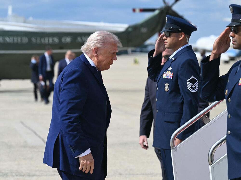 President Trump walks to board Air Force One prior to departure from Joint Base Andrews in Maryland on Friday en route to New Jersey for the weekend.