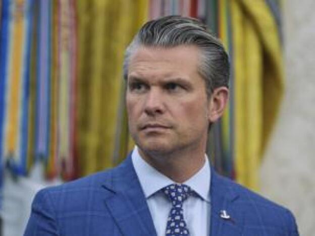 Defense Secretary Pete Hegseth listens during an event with President Trump to sign executive orders regarding nuclear energy in the Oval Office of the White House, Friday, May 23, 2025, in Washington, D.C..