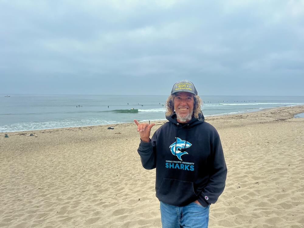 Surfer Milton Willis stands on Surfrider Beach, a world-famous break that has been less-accessible since the January fires led to the PCH closure.
