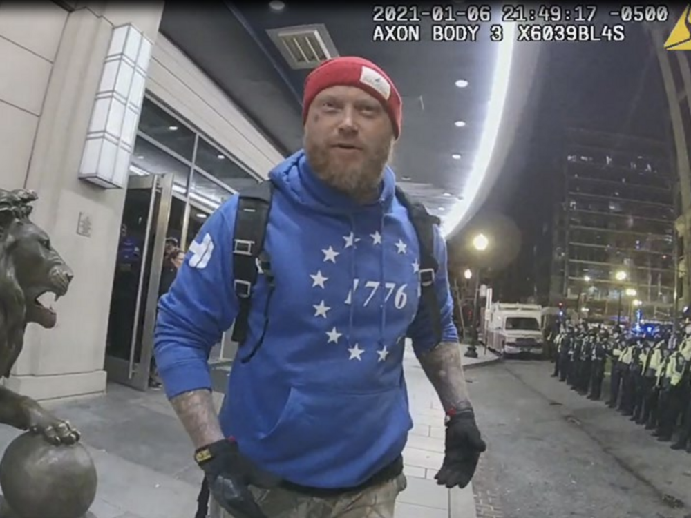Shane Jenkins, seen here in police bodycam footage from Jan. 6, 2021, was convicted of multiple charges in connection with the Capitol riot, including assaulting police. Months after receiving a pardon from President Trump, Jenkins visited the White House along with another former Jan. 6 defendant.
