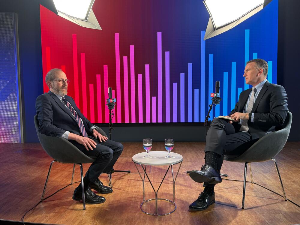 Harvard University president Alan Garber (left) sits for an interview with NPR's Steve Inskeep in Boston on May 26.