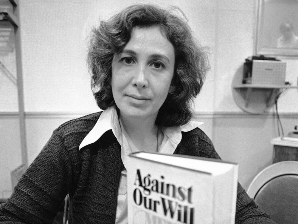 Susan Brownmiller poses with her book in New York, Oct. 18, 1975.