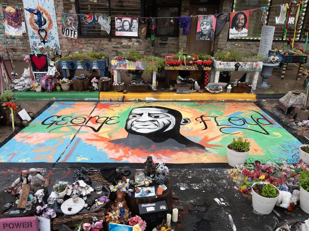 A mural of George Floyd marks the place where he was murdered by Minneapolis police near the intersection of 38th Street and Chicago Avenue, Tues., May 20, 2025, in Minneapolis, Minn. During the past five years, the intersection, which has come to be known as George Floyd Square, has served as a memorial space for all those who have died at the hands of law enforcement.