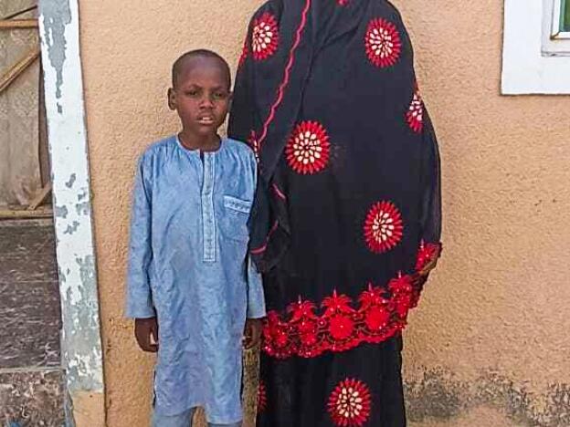 Mariam Mohammed and her surviving son, Umar. Like his brother who died, Umar has sickle cell disease, and she worries about his health.