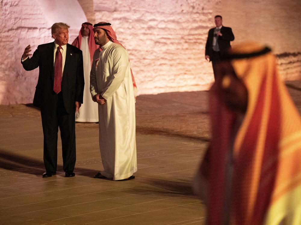 President Trump and Saudi Arabia's Crown Prince Mohammed bin Salman walk in the old district on the outskirts of the Saudi capital Riyadh on May 13. Trump announced several big economic agreements on his recent trip to the Middle East, but said little about the conflicts in the region.
