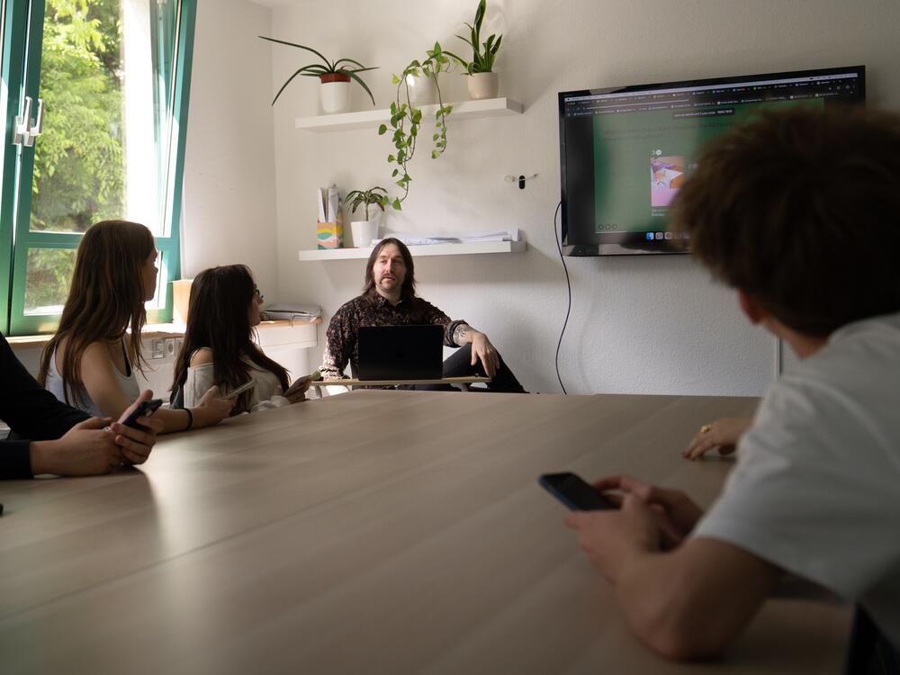 Patrick Konigh teaches a sophmore class at Engame Academy in Budapest where they offer after school classes to students who are learning English and preparing to study abroad.