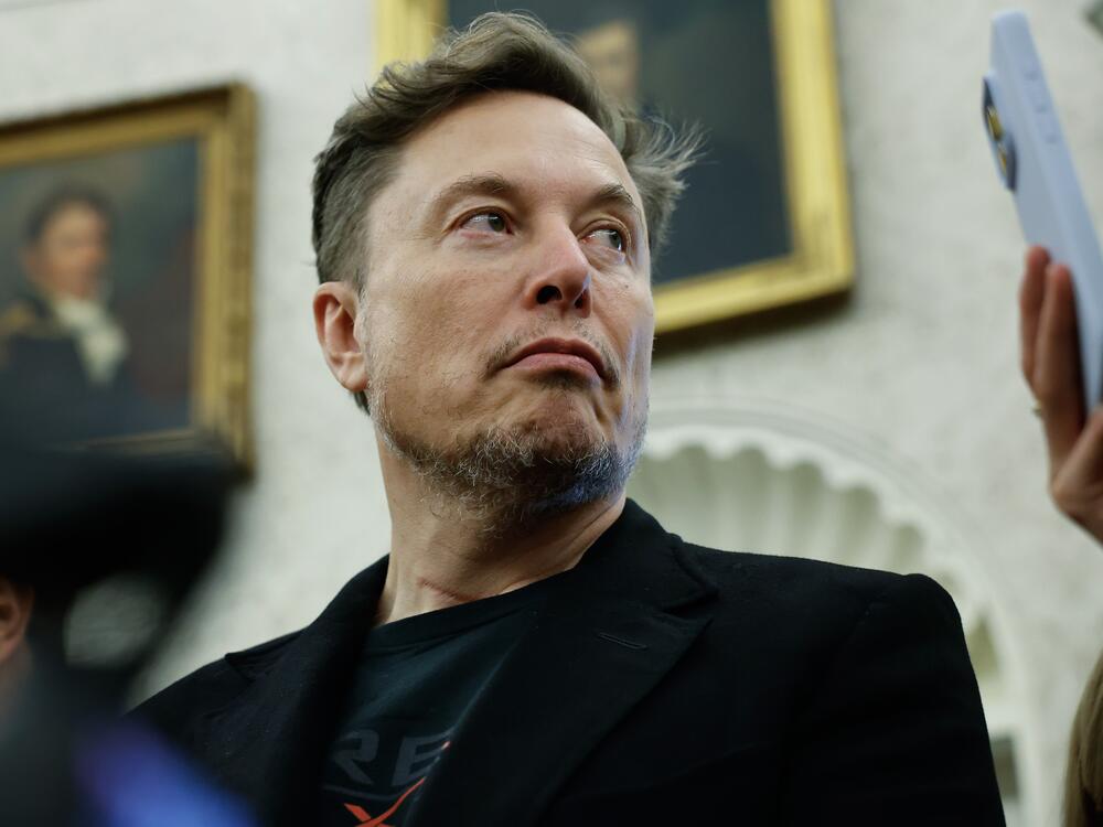 Billionaire White House adviser Elon Musk listens during a May 21 press availability in the Oval Office with President Trump and South Africa President Cyril Ramaphosa.