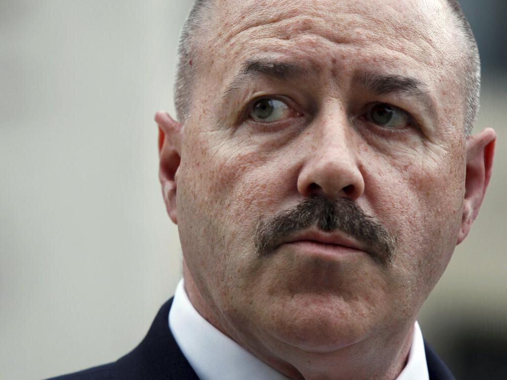 Former New York City police Commissioner Bernard Kerik is shown standing outside the Federal Court in Washington, June 4, 2009.