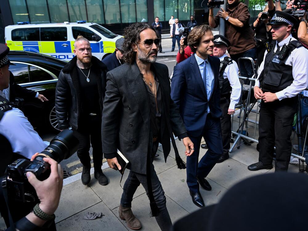 Russell Brand arrives at Southwark Crown Court on Friday in London.