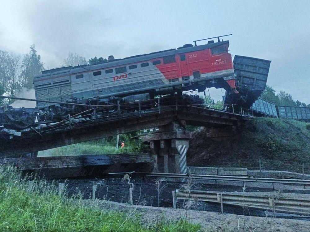 This photo released by Acting Governor of the Kursk Region Alexander Khinshtein telegram channel on Sunday, June 1, 2025, shows a view of a damaged bridge after the crash of a freight train in Russia's Kursk region, which borders Ukraine.