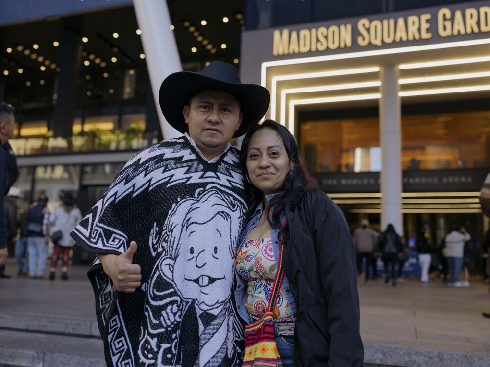 Yobani Escandon Galvan (left) and Rosalina Maldonado (right) pose for a portrait outside of Madison Square Garden before the start of Los Tigres del Norte's show.