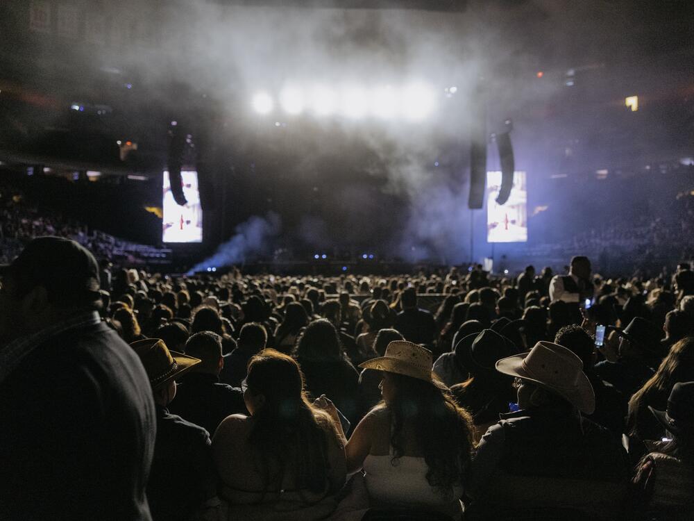 Fans eagerly await the start of Los Tigres del Norte's show at Madison Square Garden.