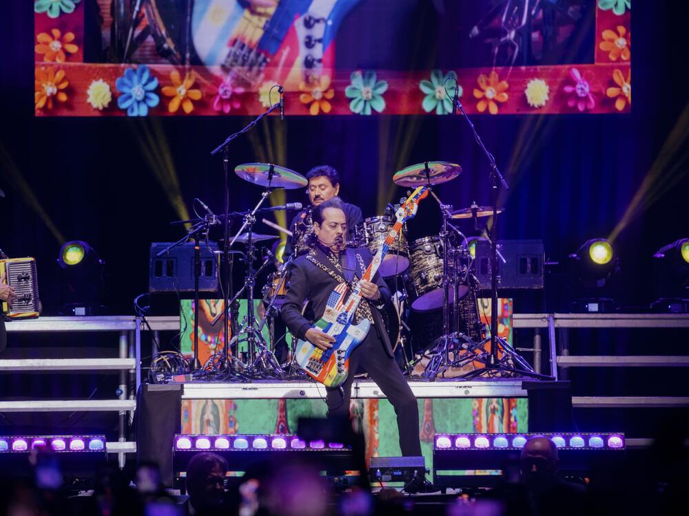 Hernán Hernández plays his bass guitar at Madison Square Garden.