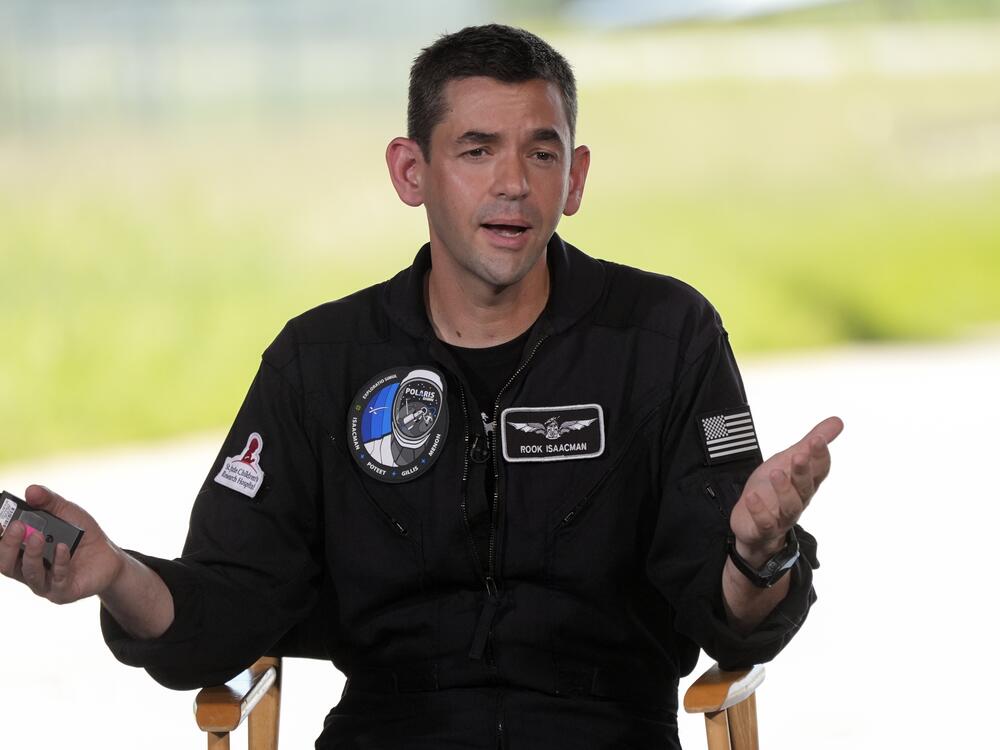 FILE - Commander Jared Isaacman speaks at a news conference after arriving at the Kennedy Space Center for an upcoming private human spaceflight mission in Cape Canaveral, Fla., Aug. 19, 2024.