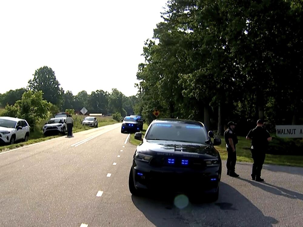 In this image taken from WSOC video, various police vehicles gather outside a community after a mass shooting, Sunday, June 1, 2025, in Hickory, a city in Catawba County, N.C.