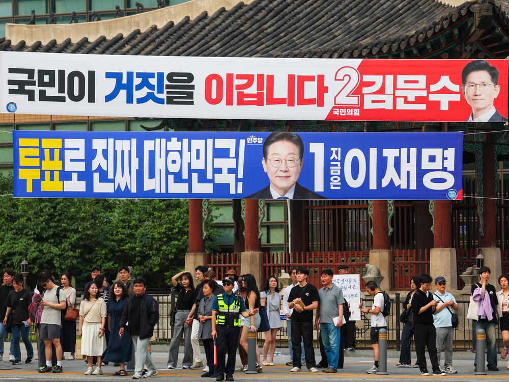 Election campaign banners for presidential candidates Lee Jae-myung of the Democratic Party of Korea and Kim Moon-soo of the People Power Party are seen on May 31 as the country's presidential election nears, in Seoul, South Korea.