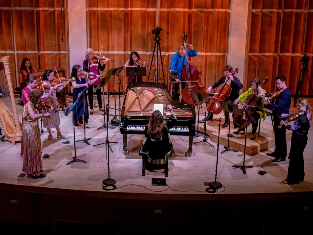 Simone Dinnerstein (center) performs with her chamber music ensemble, Baroklyn. She says using an iPad to read the score while performing has been 