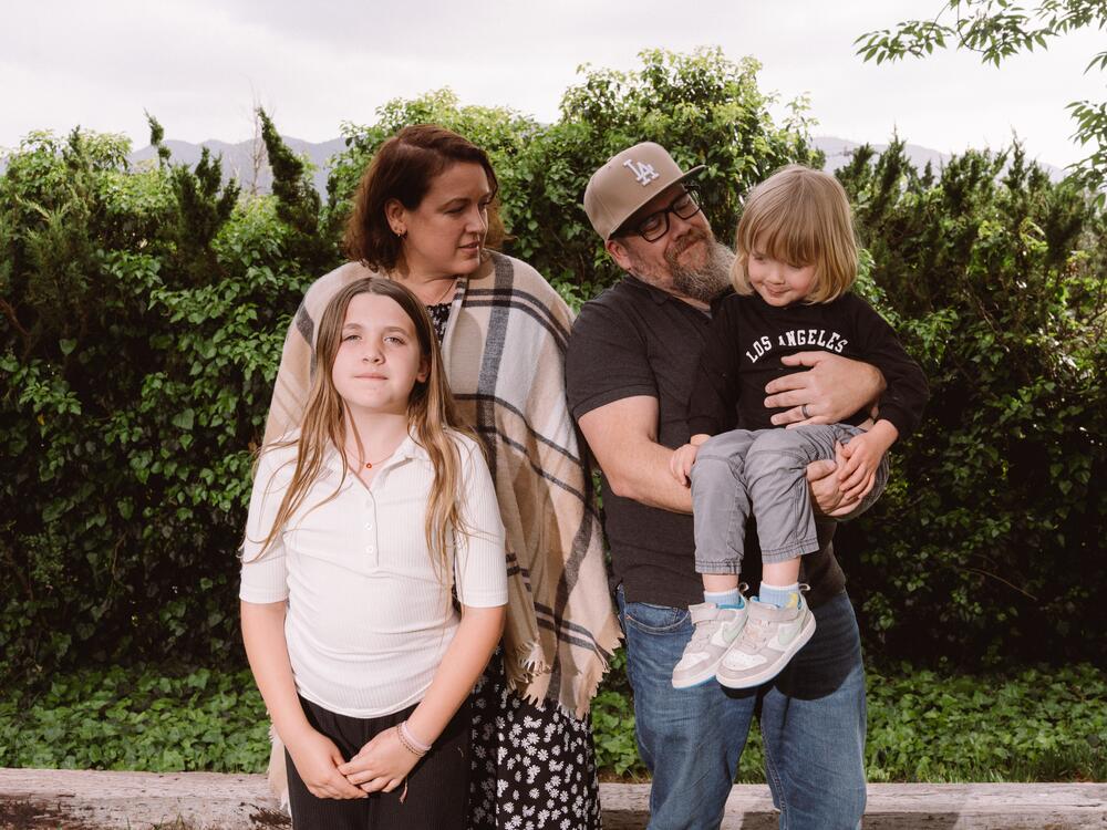 The Stumme family poses for a portrait in their backyard of their new home in La Crescenta-Montrose.